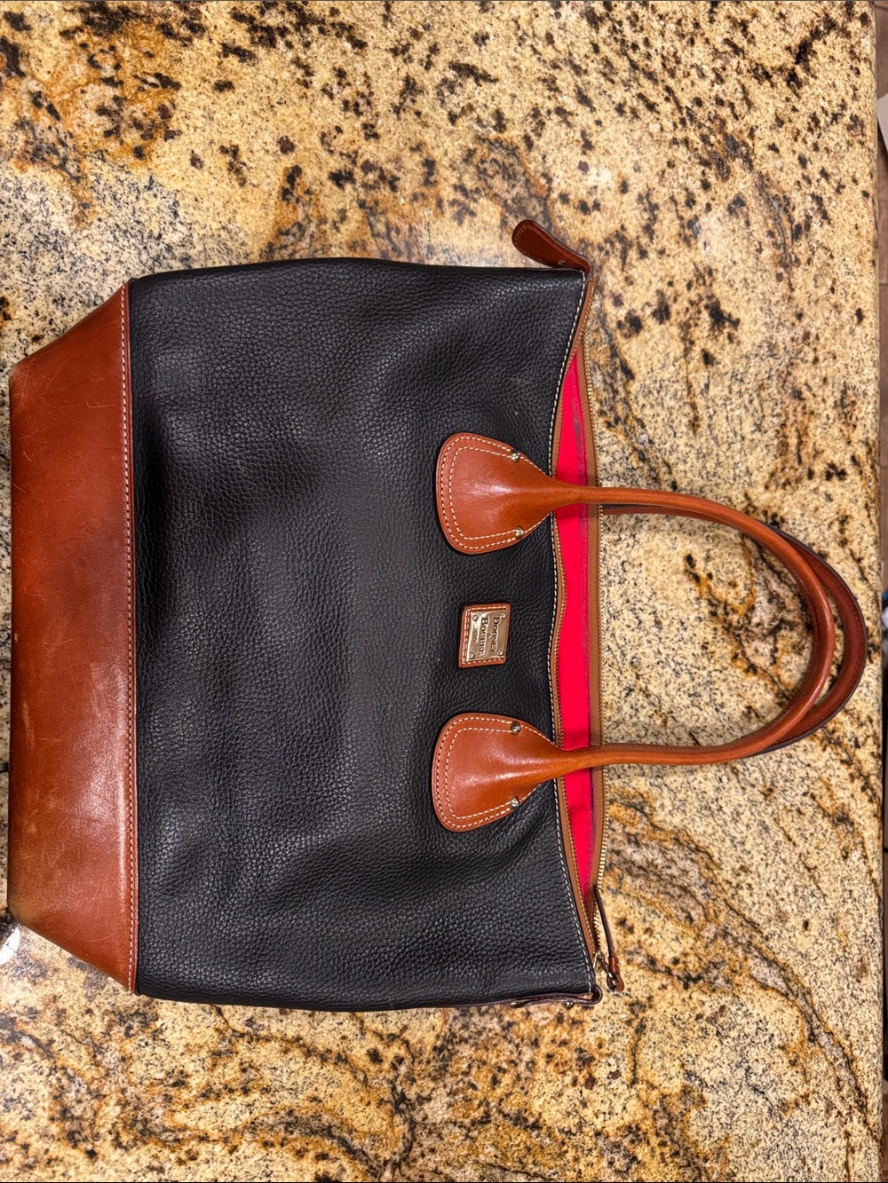 Dooney & Bourke Black Pebbled Leather Tote with Brown Trim and Red Interior